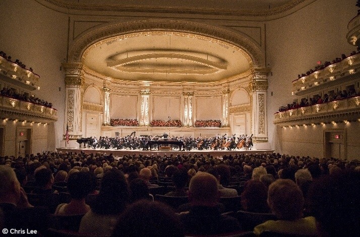 New York Philharmonic performing at Carnegie Hall's Stern Auditorium/Perelman Stage before a capacity audience. © Chris Lee.