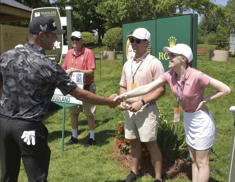 Walk 18 holes with a TOUR pro during the Travelers Championship
