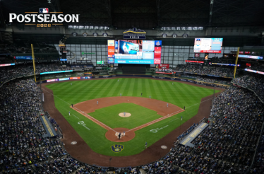 American Family Field during MLB Postseason 2026, Brewers logo on the mound, crowd filling the retractable-roof stadium. Logo of MLB, upper-left.