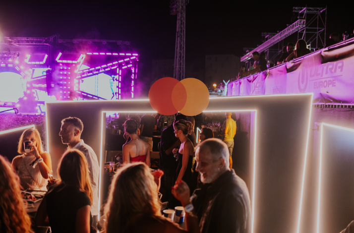 People enjoying music and drinks in the VVIP Mastercard Zone during Ultra Europe 2026 in Split, Croatia.