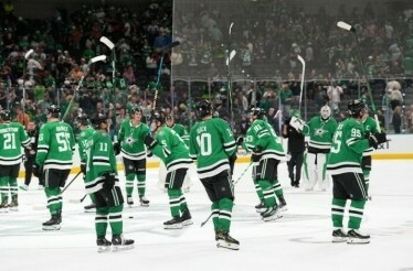 The Dallas Stars players are skating on the ice at the American Airlines Center.