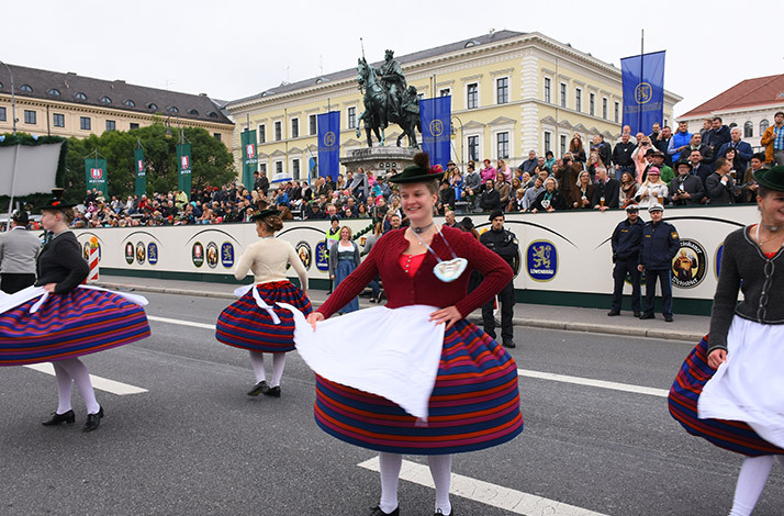 Witness Oktoberfest's costume parade from grandstand seats