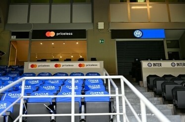 View on sky box seats at San Siro Stadium from tribunes.