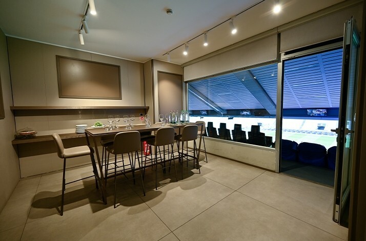 Sky box interior at San Siro Stadium.