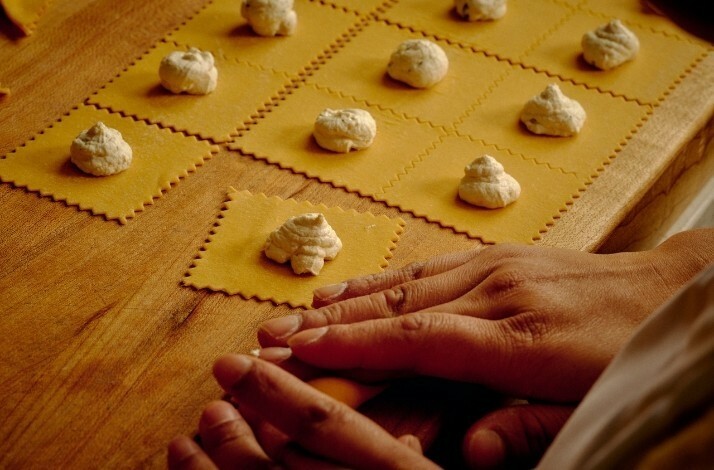 Homemade ravioli preparation with dollops of filling on pasta squares at Antico Nuovo