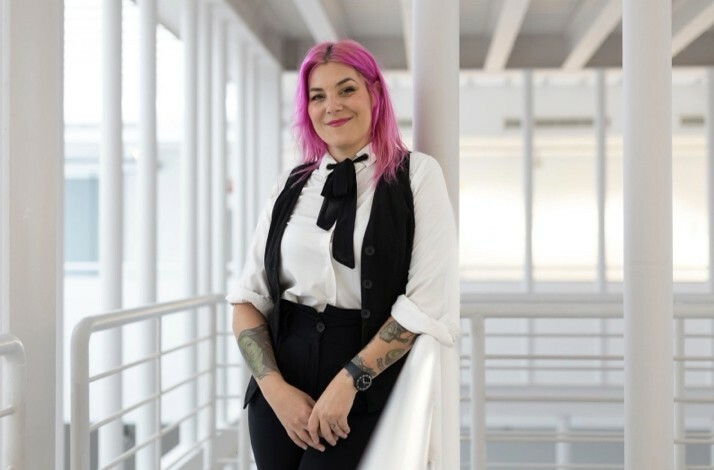 Art historian Sara Rubayo smiles as she is photographed