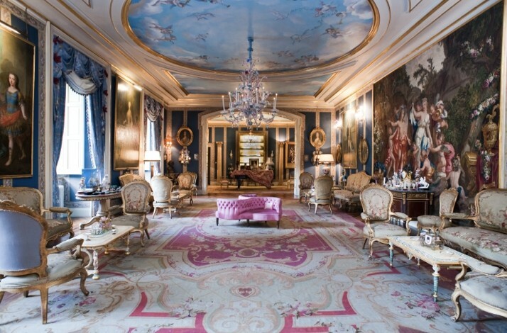 Elegant Liria palace interior with ornate furniture, chandeliers, frescoed ceiling, and detailed artwork