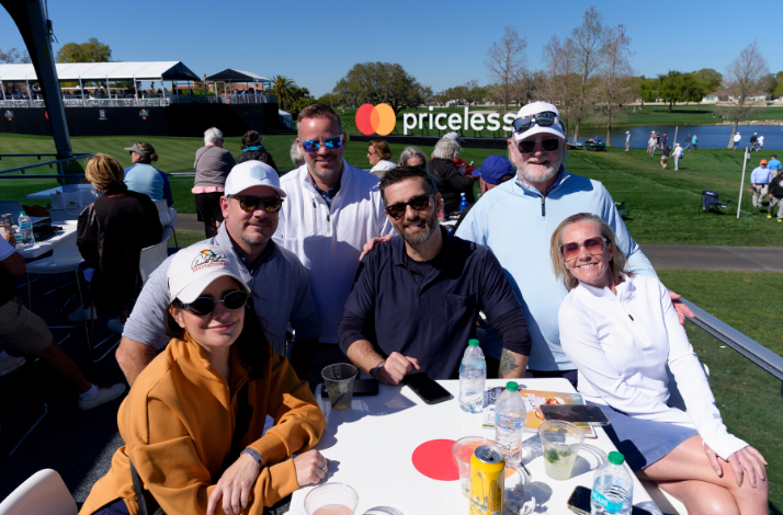 People pose during the Arnold Palmer Invitational.