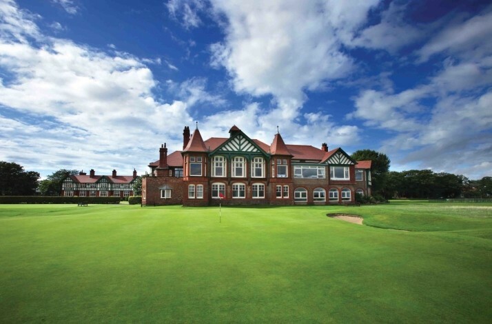 Royal Birkdale Golf Club, main clubhouse with a flag on the course.