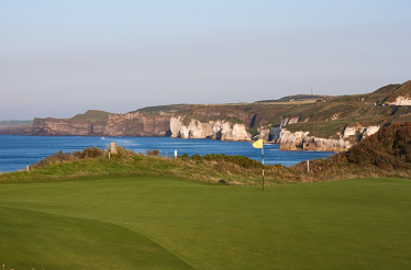 View at the cliffed coastline of Royal Portrush Golf Club.