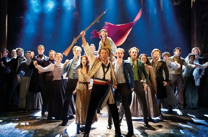 Actors performing  Les Misérables on stage of the  Sondheim Theatre, London