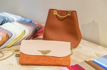 Women’s clutch bag and handbag made during leatherworking masterclass at Atelier La Patine in Paris.