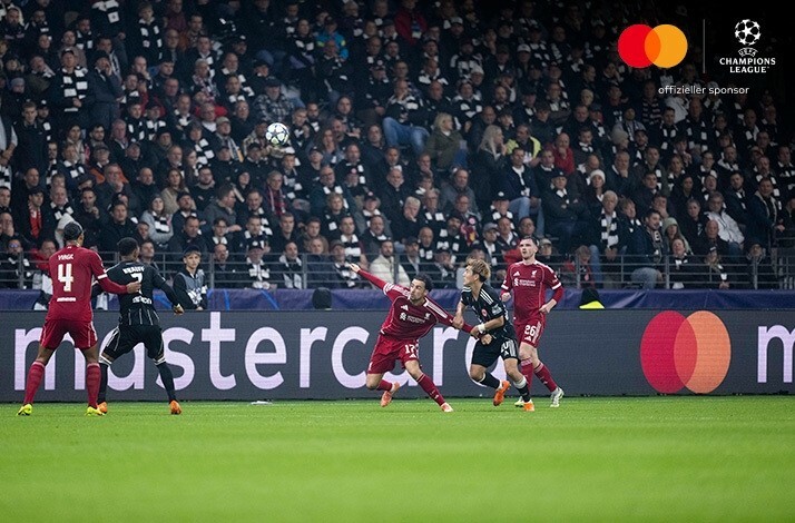 Players of Eintracht Frankfurt and Liverpool FC photographed during an UEFA Champions League match.