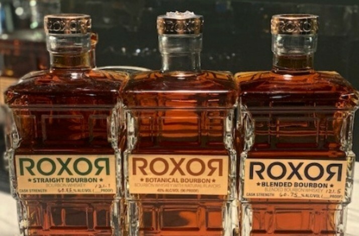Three bottles of ROXOЯ Spirits.