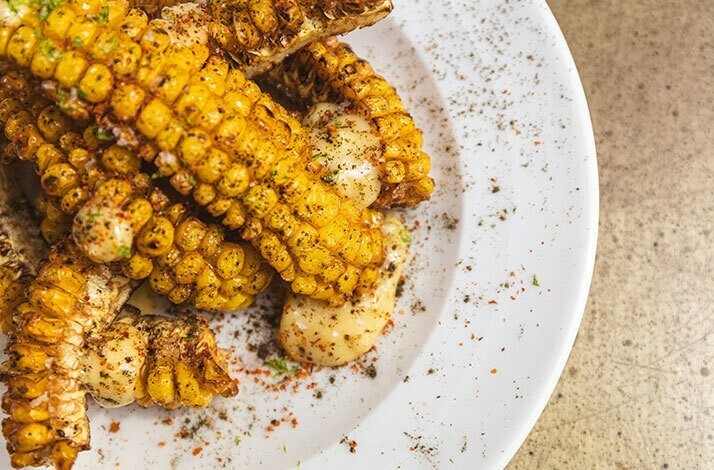 Freshly prepared dish with corn served at Dubai's most renowned restaurants