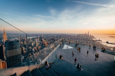 People on the VIP experience at Edge at Hudson Yards enjoying the view on the city.