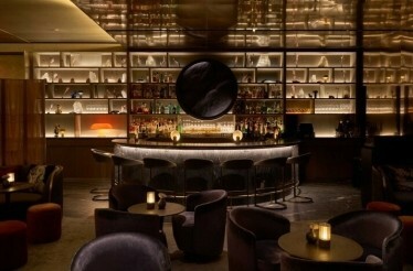 Cozy indoor view of Quin Bar featuring warm lighting and inviting décor.