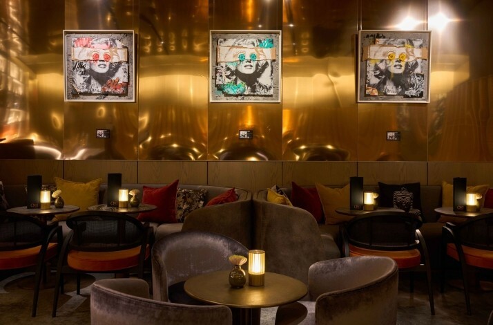 Cozy indoor view of Quin Bar featuring warm lighting and inviting décor.