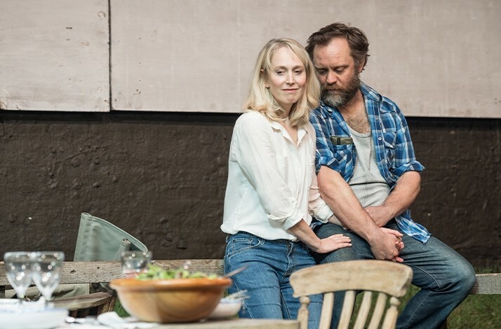 Actors on stage performing Juniper Blood at Donmar Warehouse.
