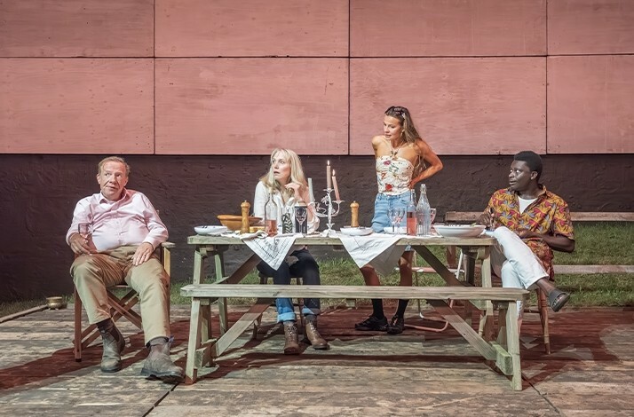 Actors on stage performing Juniper Blood at Donmar Warehouse.