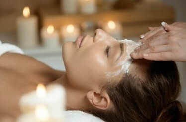 The lady is enjoying the facial massage at  La Dehesa Experiences.