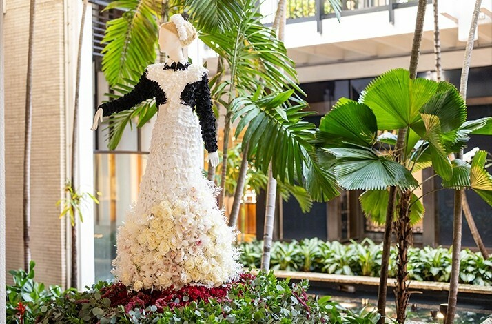 Housekeeper uniform made out of flowers on display at Kew Gardens