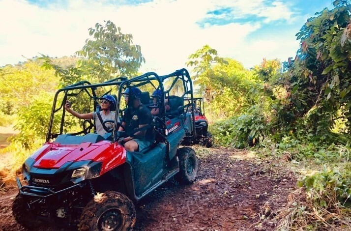 A group of people on a guided off-road buggy tour of Punta Cana 