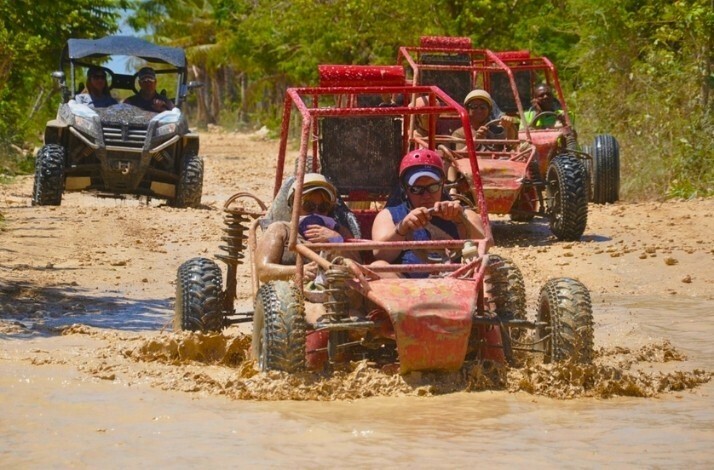 A group of people on a guided off-road buggy tour of Punta Cana 