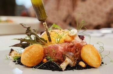 A full meal made of local ingredients served at restaurant of Beach Resort