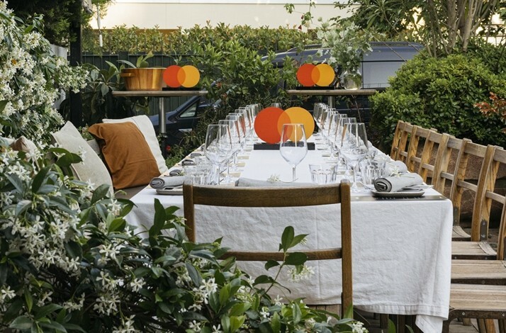 Large dinner table served for a curated dinner at Apartıman Yeniköy restaurant in Istanbul.