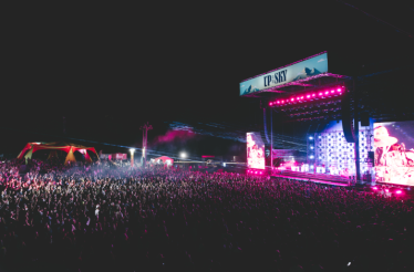 A crowd enjoying live music at the Up in the Sky Festival.