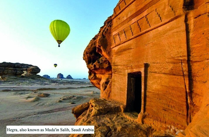 A UNESCO World Heritage site AlUla and two air balloons in the sky.