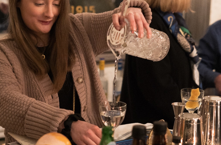 A person mixing a cocktail during a masterclass at Dante