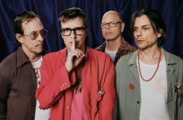 Promotional banner for WEEZER: The Gathering, displaying the band members.