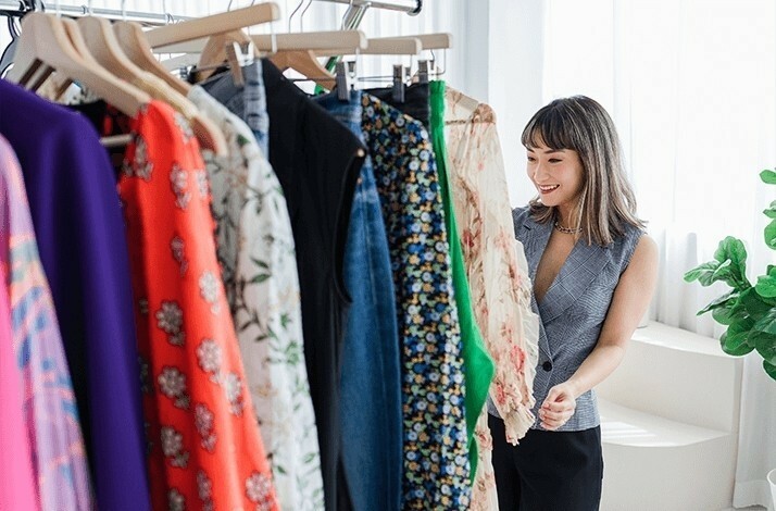 Sera Murphy browses through a collection of clothes at The Reoutfitter