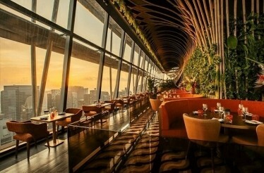 Tuck into a luxury tasting menu with caviar, wine, sake, bubbly, and a view: In Singapore, Singapore