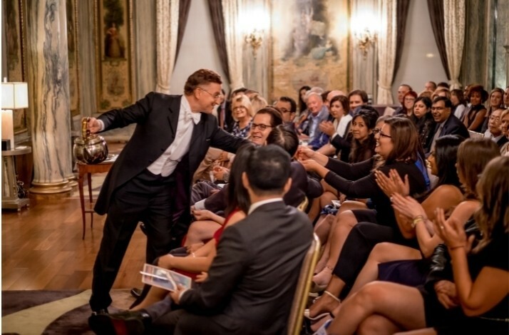 Steve Cohen doing a show to an audience up close.