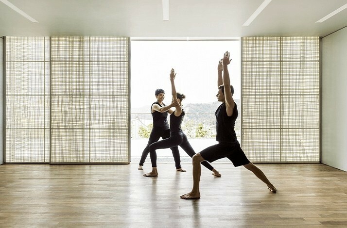 People practising Yoga at Como Point Yamu.