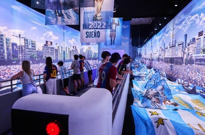 Visitors looking at the memorabilia at the Messi Experience
