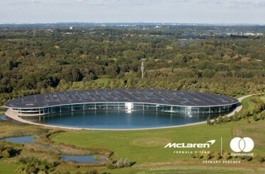 View on McLaren Technology Centre (MTC) and its territory. The image is featured with McLaren and Mastercard logos at the bottom right