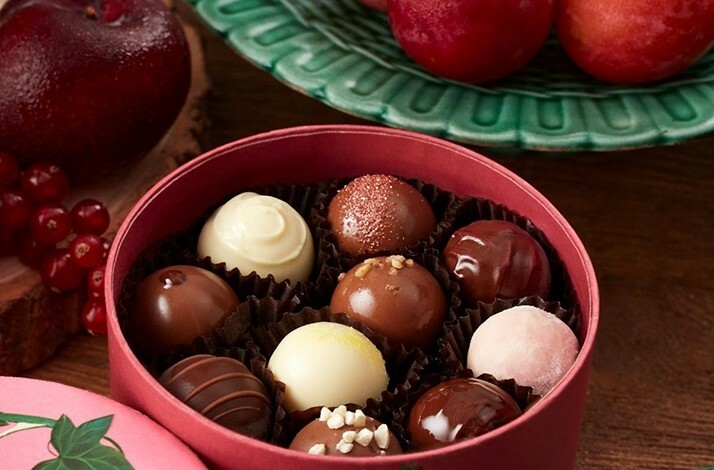 A box of assorted flavours of chocolates from Fortnum & Mason.