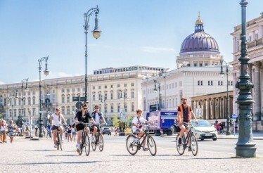 A group of people on a guided bike tour in Berlin, Germany