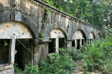 Explore a hidden WWII island fort and abandoned tunnels at sunrise: In Singapore, Singapore