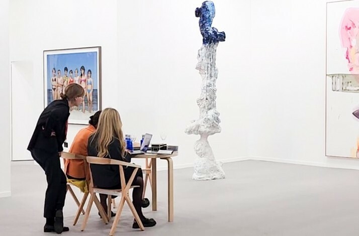 Guests enjoying a private art collection at Culto Gallery, Bogotá, Colombia.