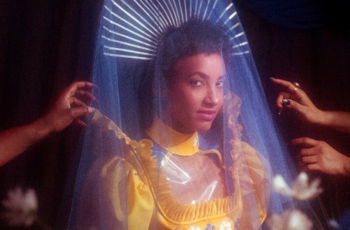 Promotional banner for Esperanza Spalding