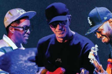 Chris Dave x Pino Palladino x Isaiah Sharkey Trio during concert on stage.