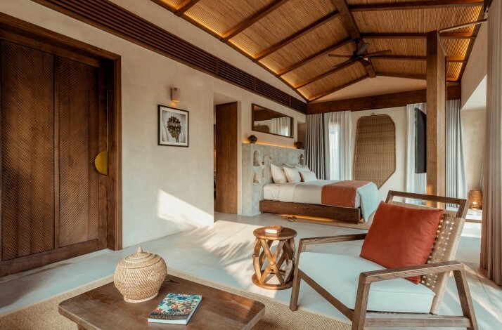 Cozy bedroom with rustic furnishings, wood accents, and warm lighting