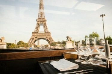 View of the Eiffel Tower from inside Bustronome Paris.