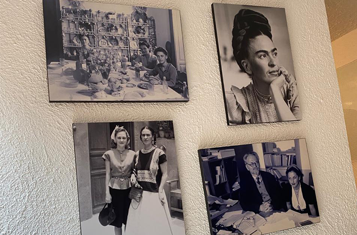 Archival photographs displayed inside Casa Kahlo