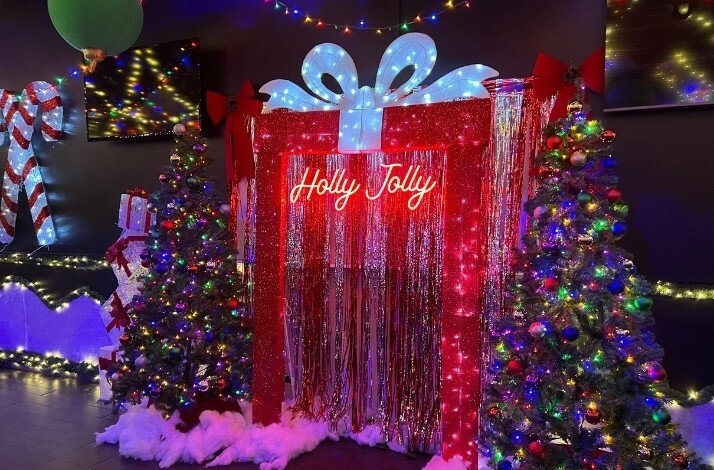 Christmas decorations in the shape of a gift box at Holly Jolly Bar